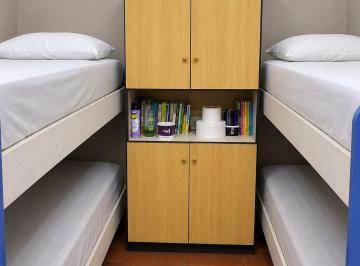Departamento de 1 ambiente, Rosario · Pieza Habitacion Compartida con Armarios y Heladera Solo Chicas