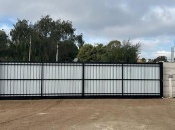 Bodega-Galpón · 695m² · Alquiler Galpón con Oficina en Ruta 101 y Ruta 102