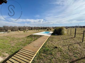 Casa · 140m² · 3 Ambientes · 1 Cochera · Venta Casa Alto de Los Reartes 2 Dorm