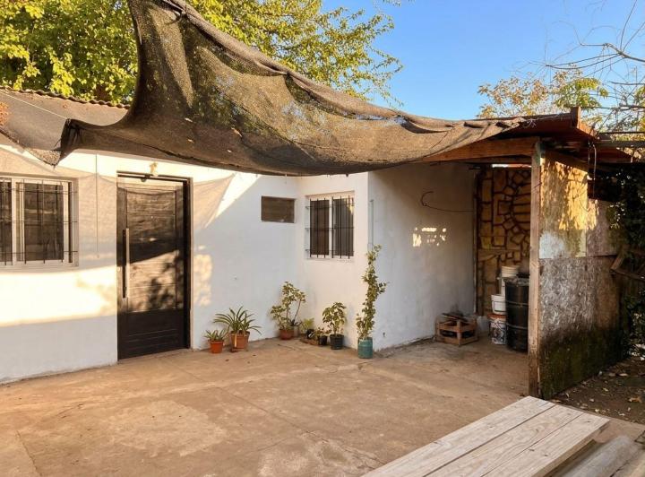 Casa · 210m² · 8 Ambientes · 1 Cochera