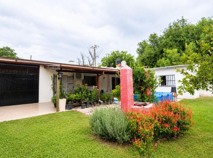 Casa · 130m² · 5 Ambientes · 2 Cocheras
